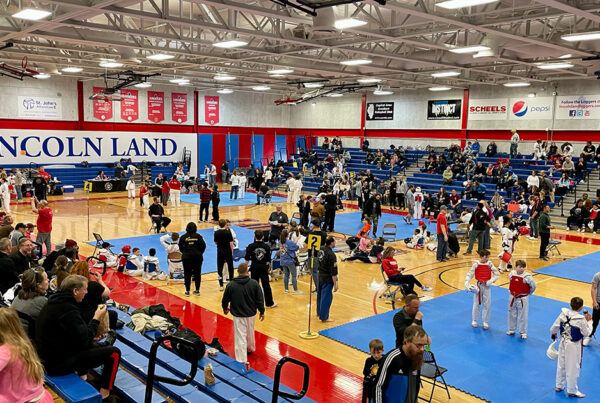 The tournament floor at the 2024 Bill Auvenshine Memorial filled with athletes, coaches, and supporters.