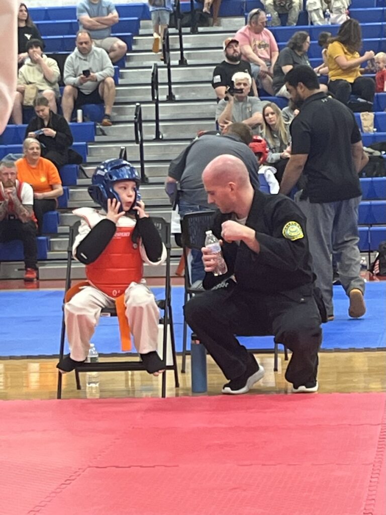 Sensei Adam coaches Weston during sparring