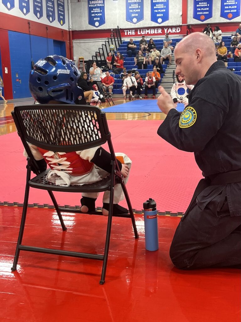 Sensei Adam coaches Weston during sparring
