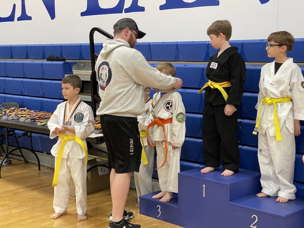 Weston getting his medal