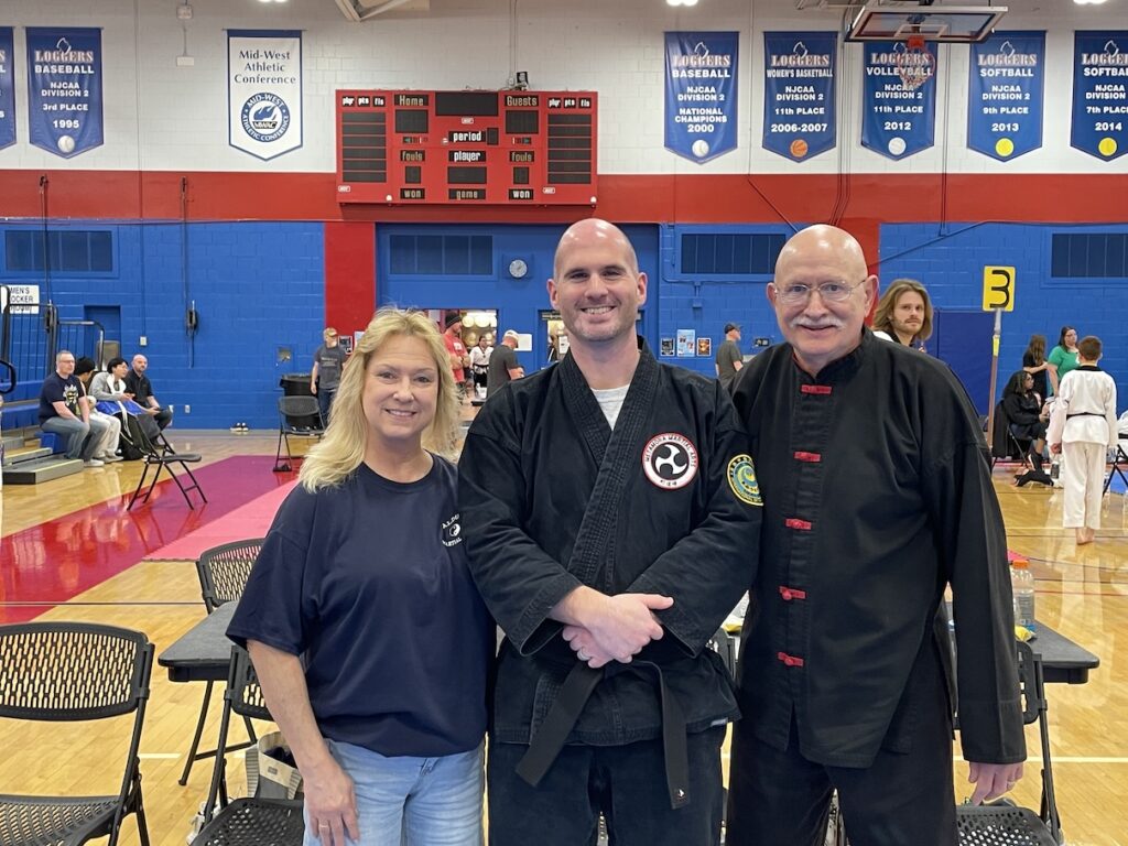 Sensei Adam with his instructors Kim Aldus, Si Gung, and Steve Aldus, Si Tai Gung